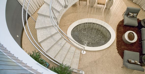Spiral staircase encircling a fountain