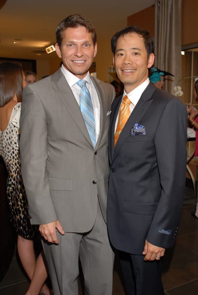 Drs. Calobrace and Mizuguchi posing together in suits